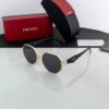 Prada_gold_black_97s
